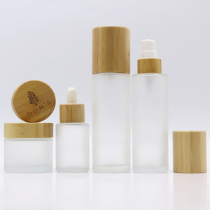 Empty bamboo cosmetic packaging 30ml 40ml 50ml 100ml 120ml frosted lotion pump glass spray dropper bottle with wood bamboo lid