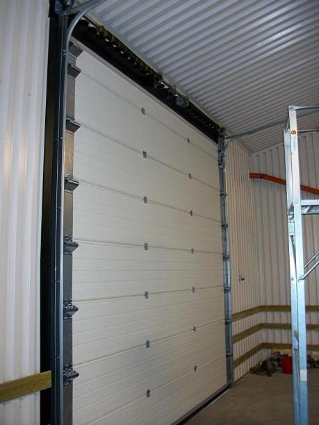 Sectional Industrial Doors and Insulated Sectional Industrial Doors with PU Foam Metal Industrial Storm Doors