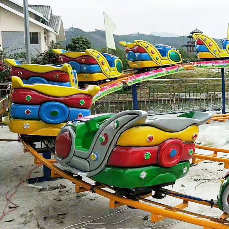 Newest children amusement parks rides electric rides amusement park roller roller coaster life size ride on dinosaurs