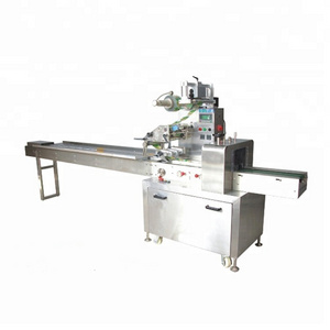 Multifunctional chocolate packaging machine/egg pie packer/food candy pillow packing machine